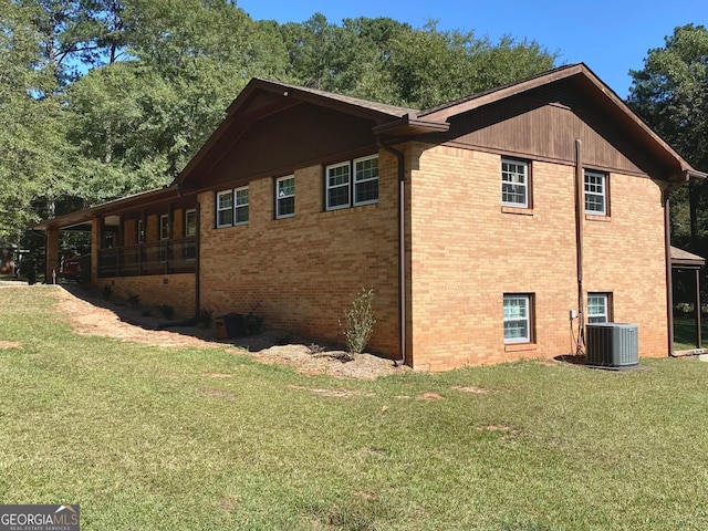 view of property exterior featuring a yard and central air condition unit