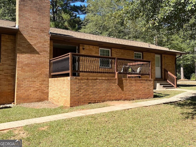 view of home's exterior with a lawn