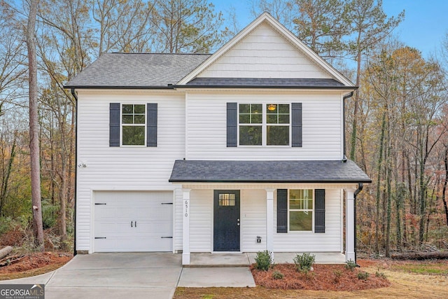 view of front of property featuring a garage