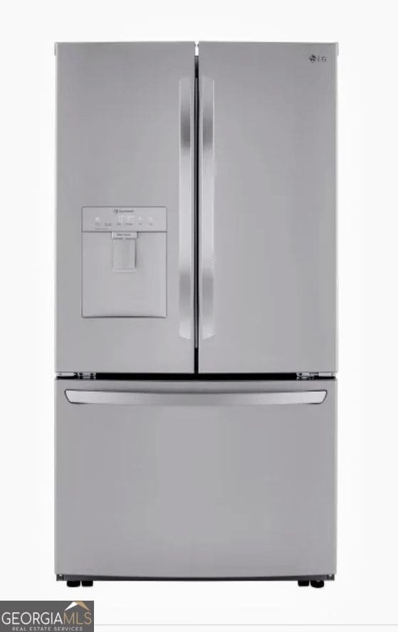 interior details with stainless steel refrigerator with ice dispenser