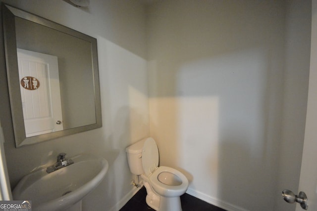 bathroom with sink and toilet