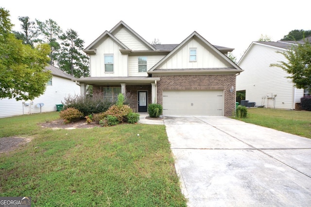 view of front of house featuring a garage and a front lawn