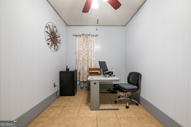 home office with light tile patterned floors and ceiling fan