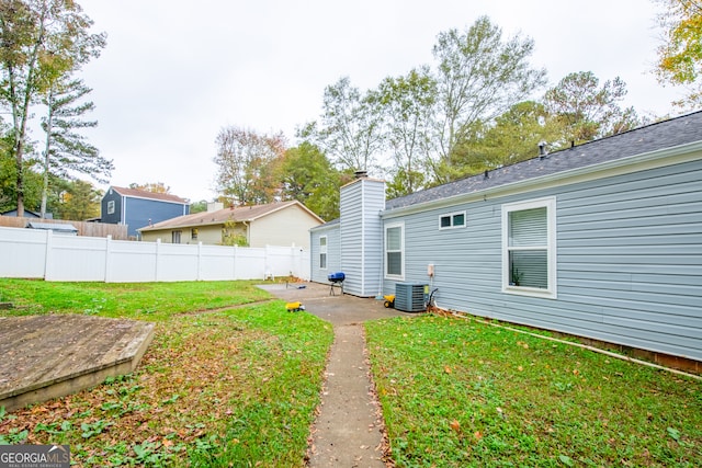 view of yard with a patio area and cooling unit