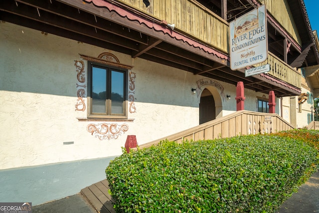 view of property exterior featuring a balcony