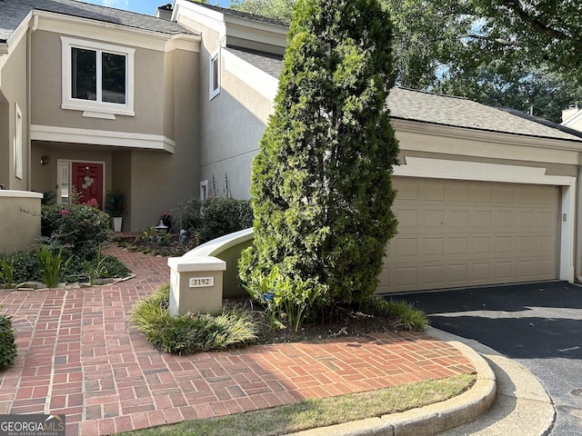 view of front of property with a garage