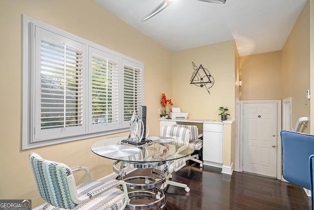 dining space featuring dark hardwood / wood-style flooring