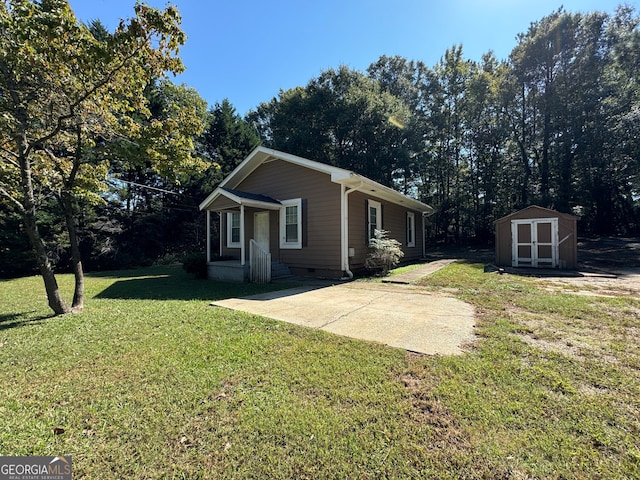 view of property exterior featuring a lawn and a shed