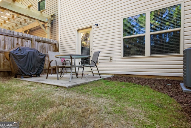 view of patio featuring a pergola and area for grilling