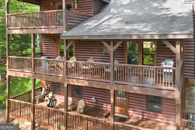 exterior space featuring a wooden deck