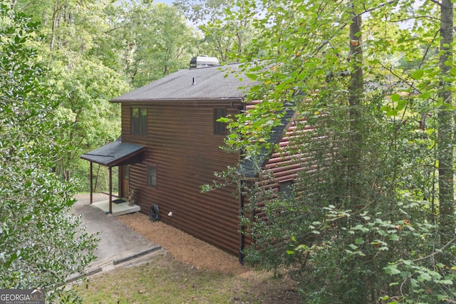 view of home's exterior with a patio area