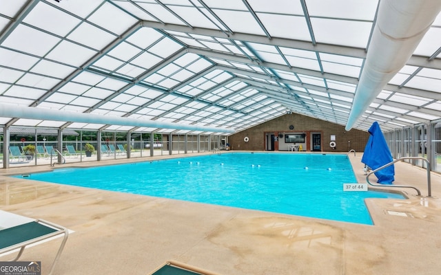 view of swimming pool featuring a patio area