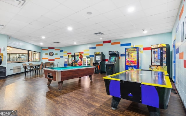 playroom featuring a drop ceiling, pool table, and dark hardwood / wood-style floors