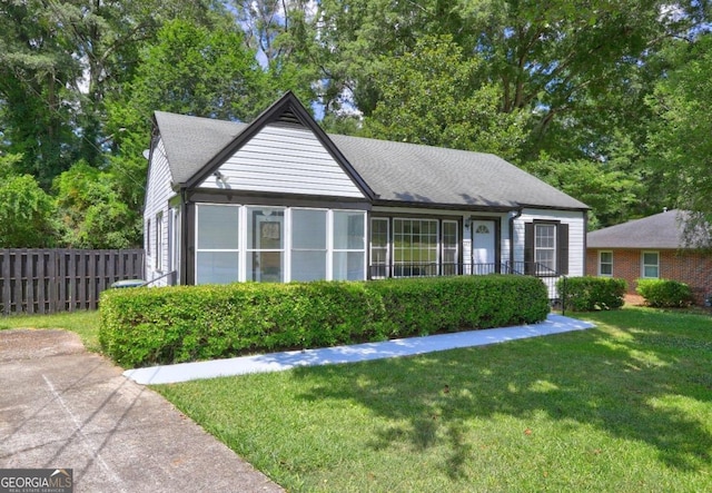 view of front of home with a front yard