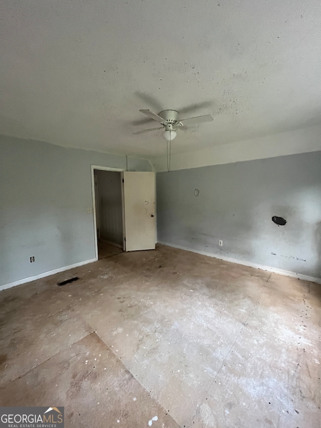 spare room featuring ceiling fan