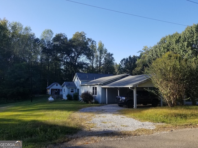 ranch-style home with a front yard