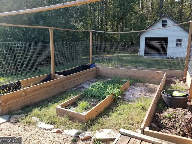 view of yard with a garage and an outdoor structure