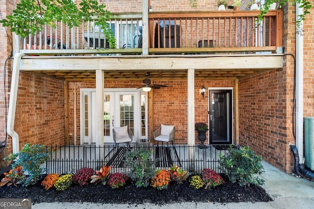 property entrance featuring french doors and a balcony