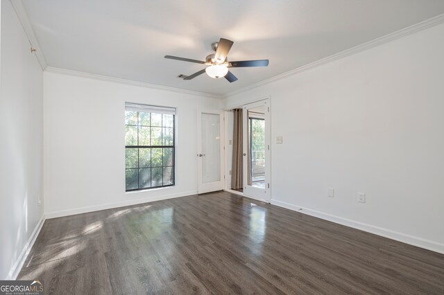 unfurnished room with ceiling fan, crown molding, and dark hardwood / wood-style flooring