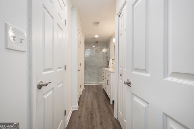 hallway featuring dark hardwood / wood-style floors