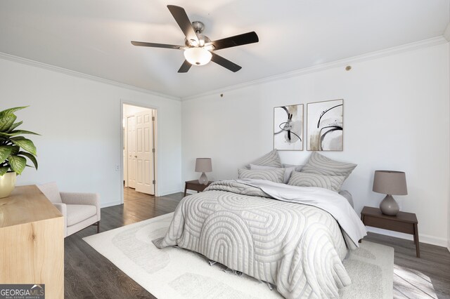 bedroom with crown molding, dark wood-type flooring, and ceiling fan