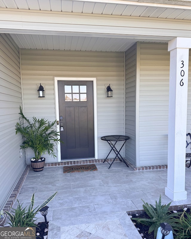 entrance to property with a porch