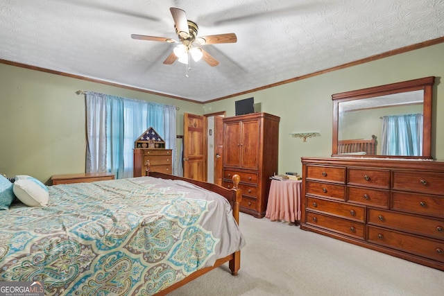 carpeted bedroom featuring crown molding, ceiling fan, and a textured ceiling