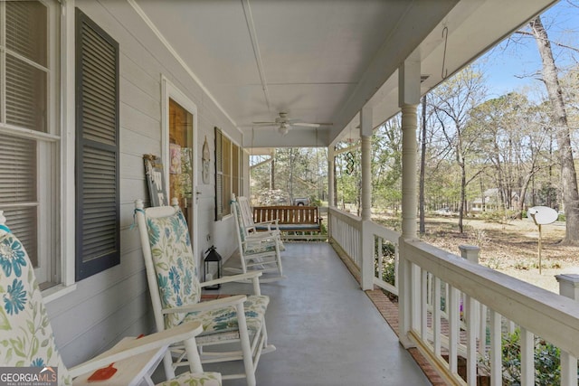 exterior space with ceiling fan