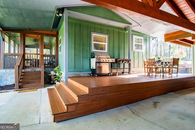 wooden deck with grilling area