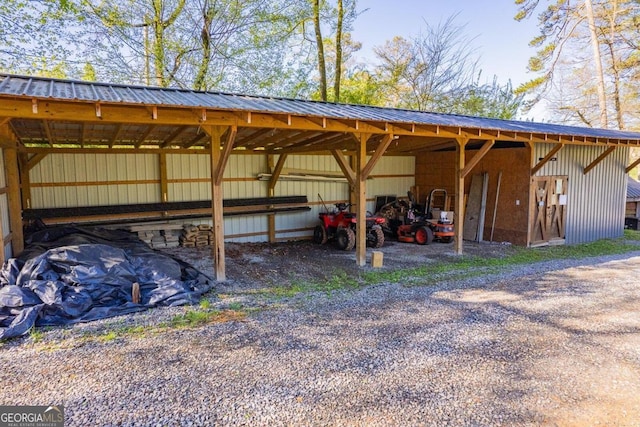 view of parking with a carport