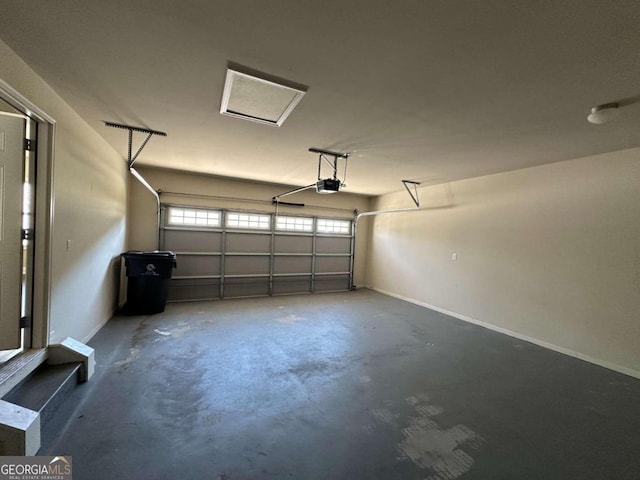 garage featuring a garage door opener