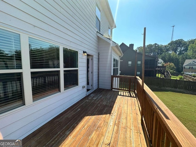 deck featuring a lawn