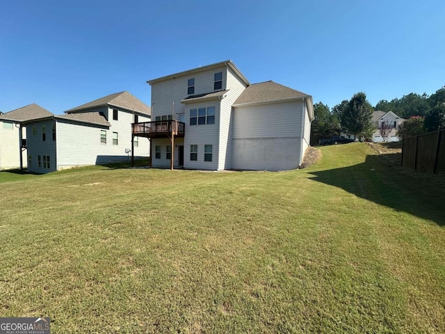 rear view of property with a lawn