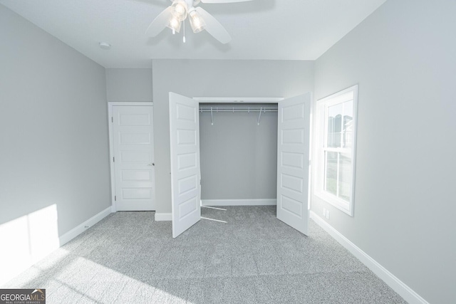 133 Amanda Trce, Kingsland, GA 31548 - unfurnished bedroom featuring carpet floors, a closet, and a ceiling fan
