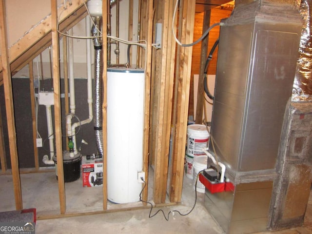 utility room featuring water heater