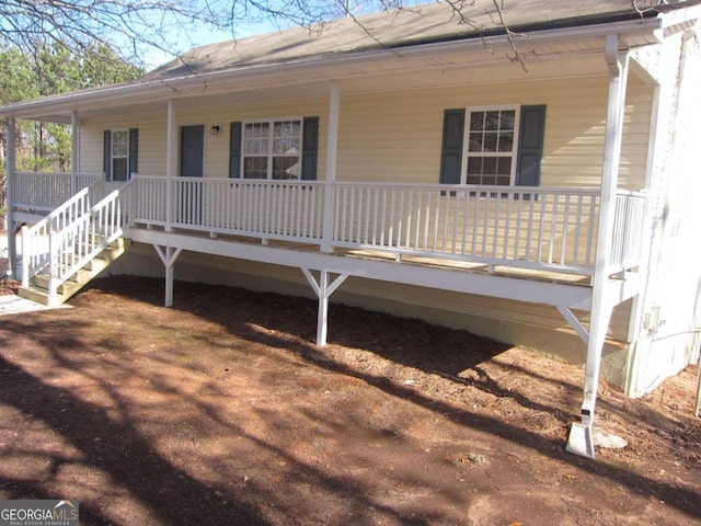 exterior space featuring covered porch