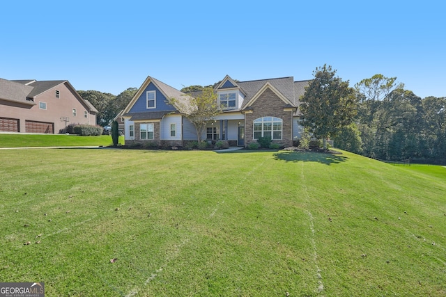 view of front of home featuring a front lawn