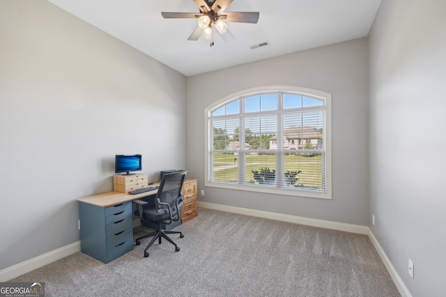 office featuring carpet floors and ceiling fan