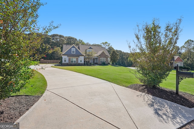 view of front of property with a front lawn