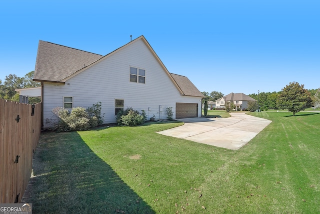 rear view of house with a yard