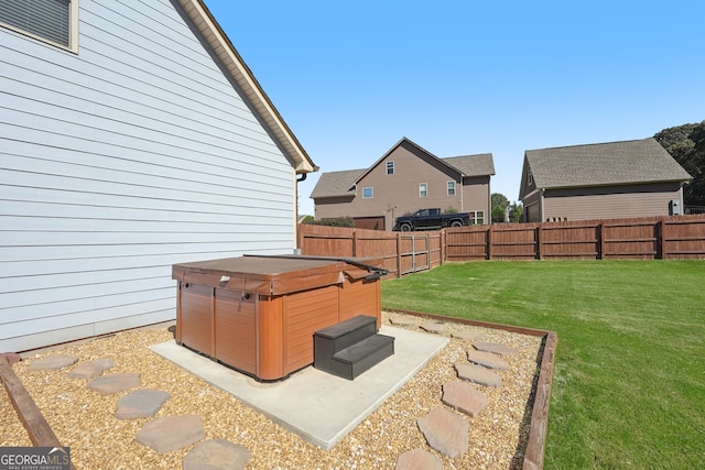 view of patio / terrace with a hot tub