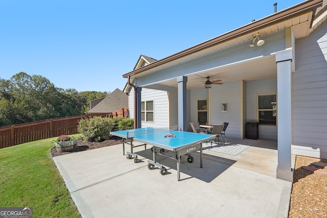 view of patio / terrace featuring ceiling fan