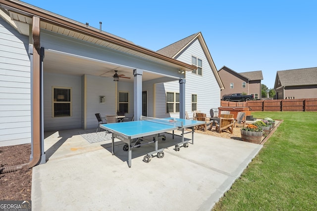 view of patio / terrace featuring ceiling fan