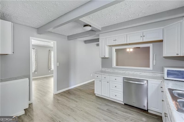 kitchen with light hardwood / wood-style floors, beam ceiling, stainless steel dishwasher, and white cabinetry