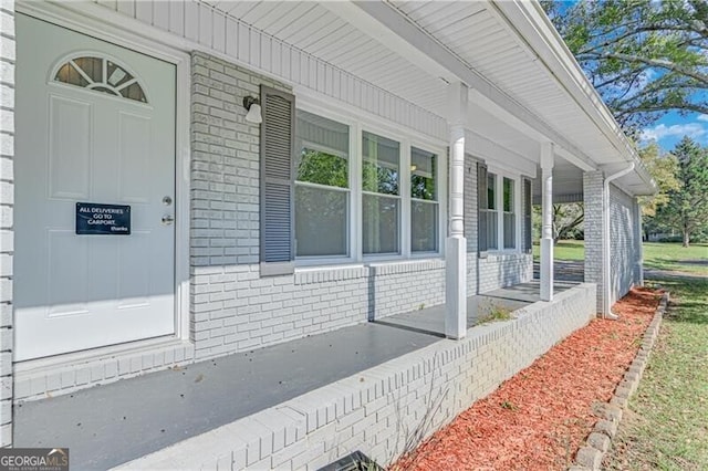 entrance to property with a porch