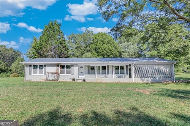 view of front of home with a front lawn