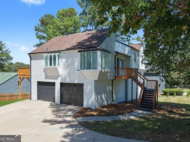 view of front of property with a garage