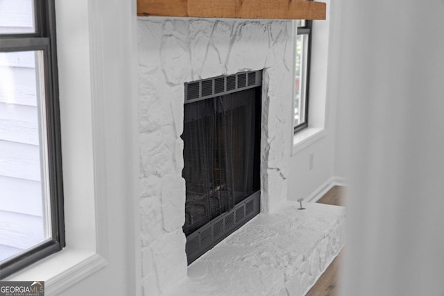 interior details with a premium fireplace