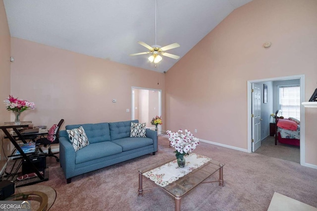 carpeted living room featuring ceiling fan and high vaulted ceiling