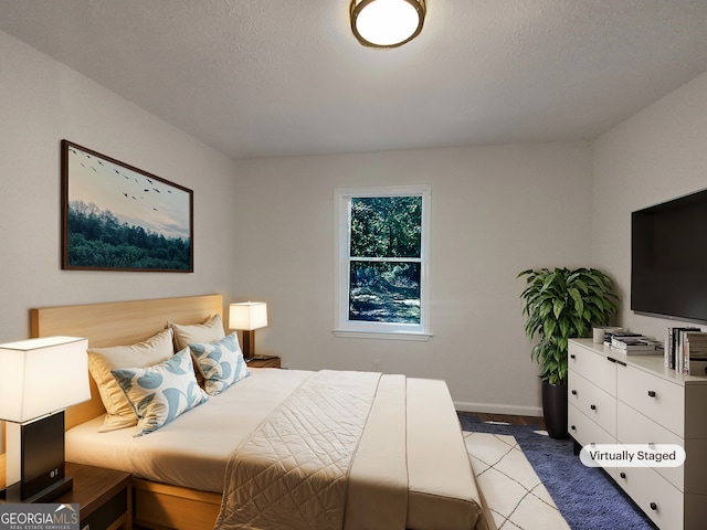 bedroom with a textured ceiling